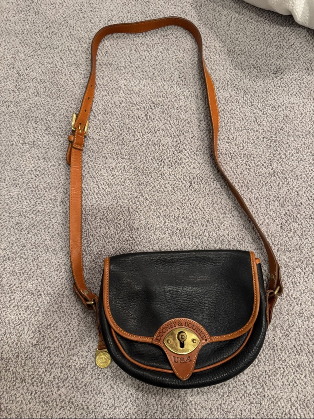 Dooney & Bourke Black with Brown Trim Leather Crossbody